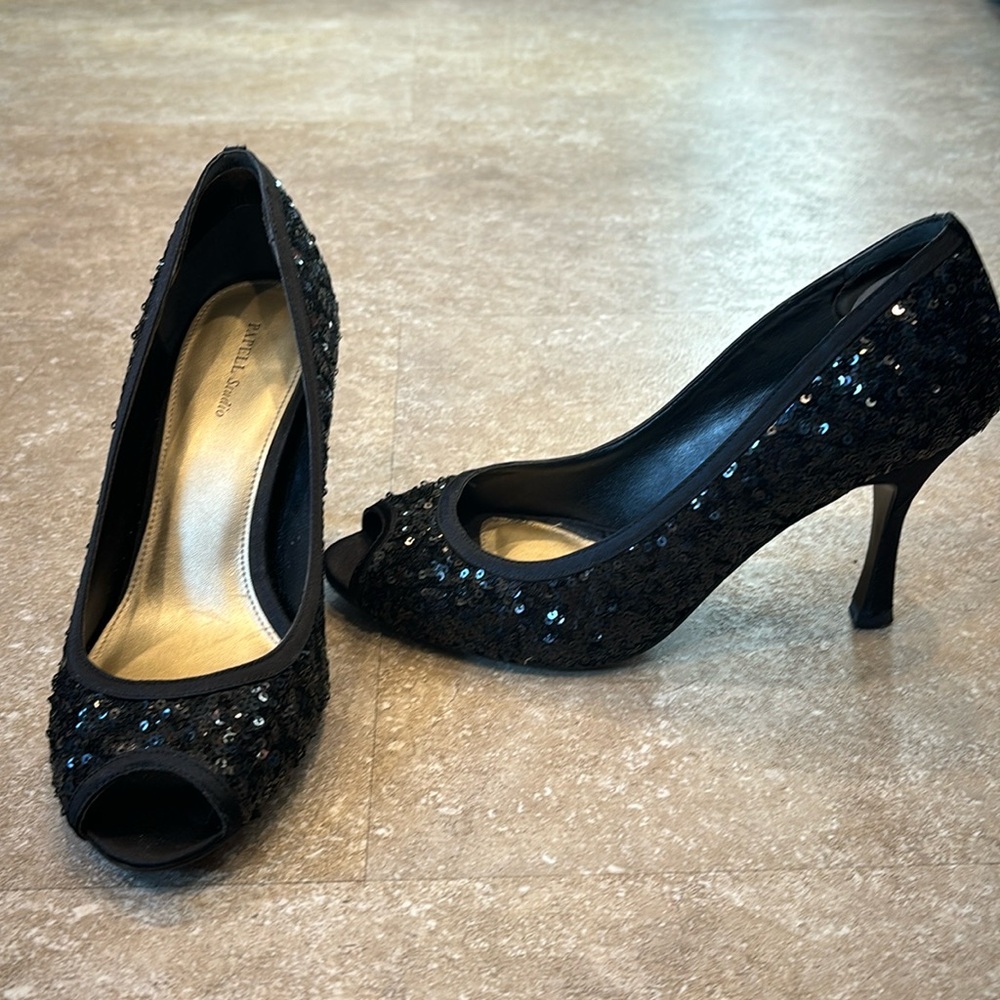 Black sequin pumps by Papell Studio. Size 8.5 M. Pep toe. 3.5 inch heel.